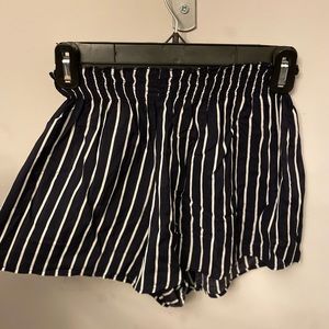 Navy and white striped flowy shorts, elastic waistband, medium